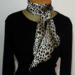 This is another version of how this scarf can be tied at the neck, showing off its curves.